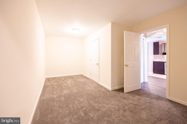 view of carpeted spare room