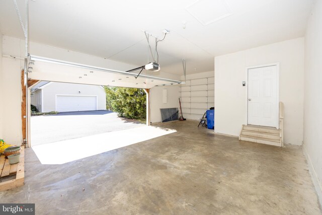 garage featuring a garage door opener