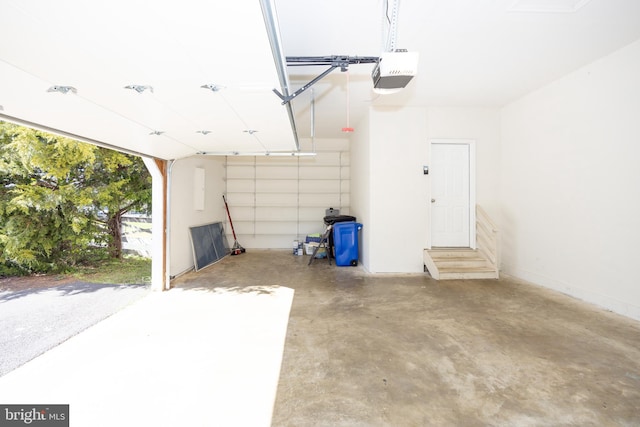 garage featuring a garage door opener