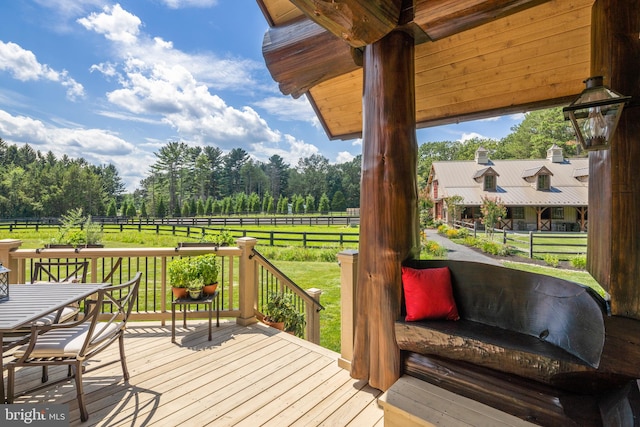 wooden terrace with a rural view