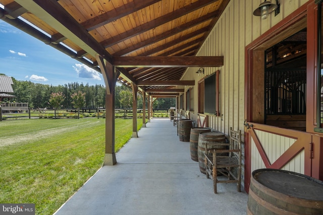 view of patio featuring an outbuilding