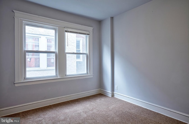 view of carpeted spare room