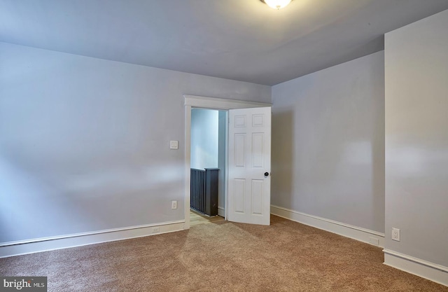 view of carpeted spare room