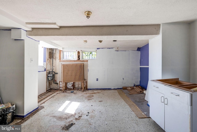 interior space with a textured ceiling