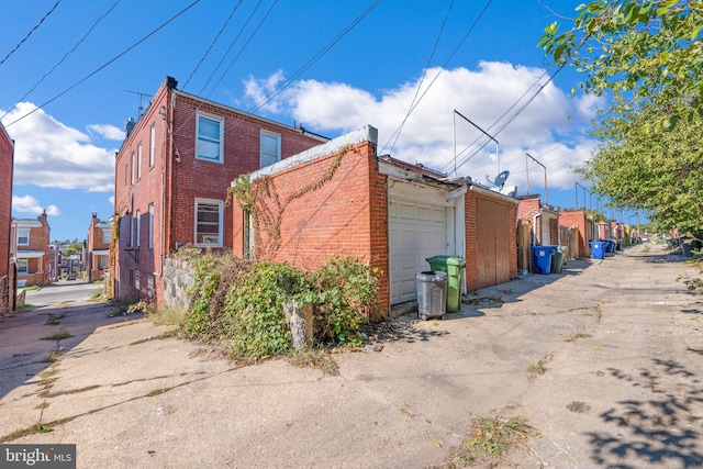 view of property exterior featuring a garage