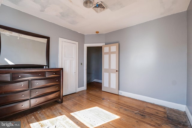 unfurnished bedroom featuring light hardwood / wood-style floors