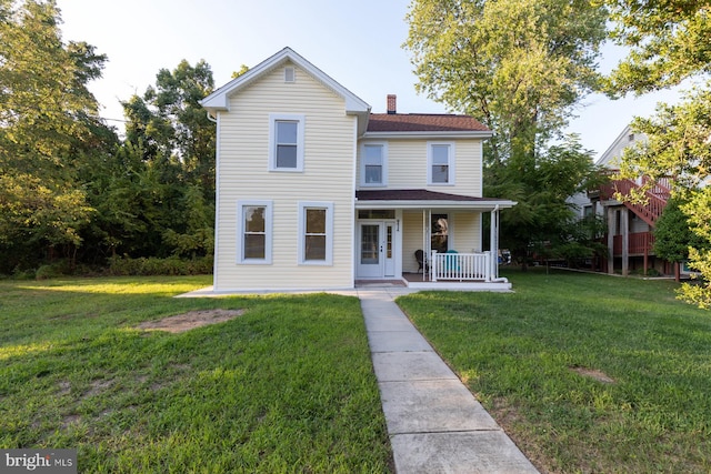 view of front of home with a front lawn