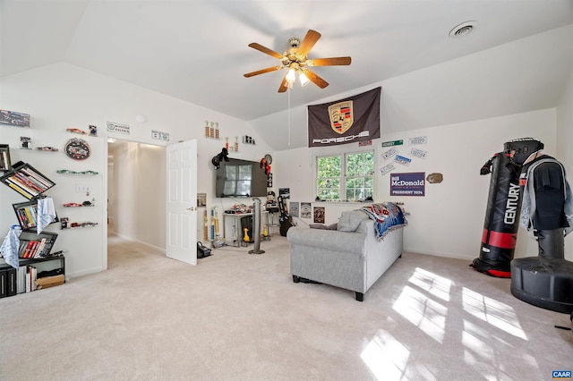 carpeted living room featuring lofted ceiling and ceiling fan