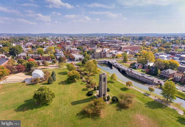 birds eye view of property with a water view and a residential view
