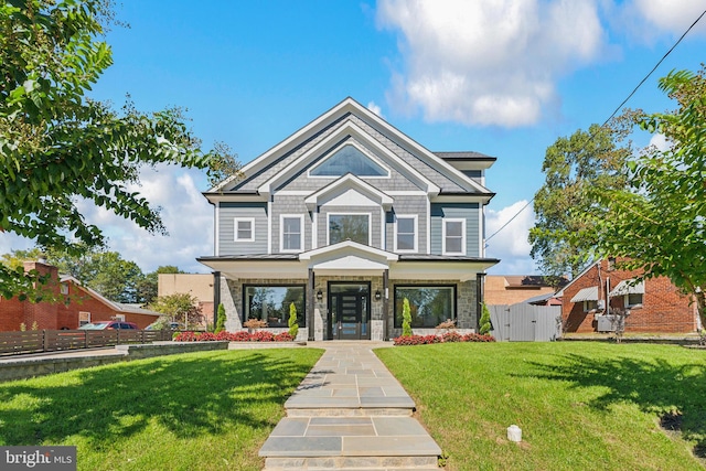 view of front of home with a front lawn