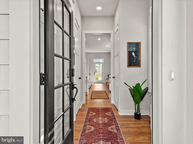 hall featuring hardwood / wood-style floors