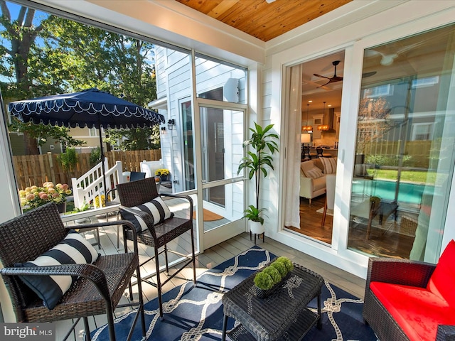 sunroom with wood ceiling