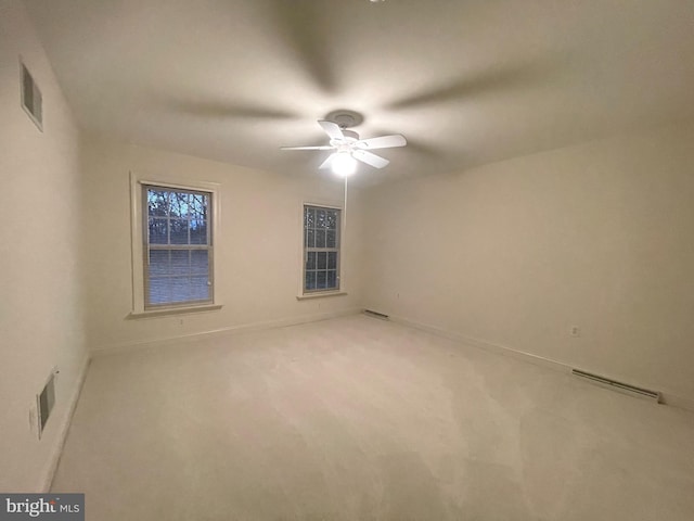 unfurnished room featuring carpet flooring and ceiling fan