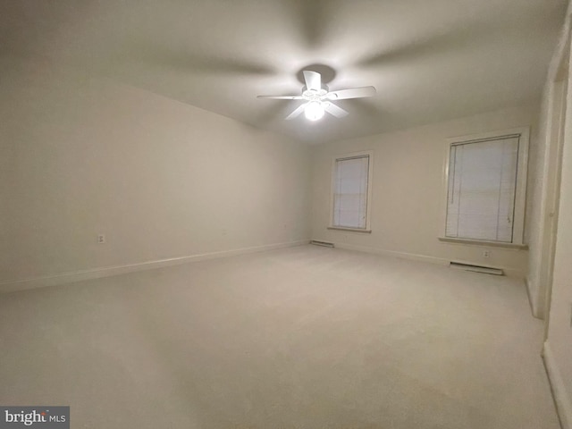 unfurnished room featuring light carpet and ceiling fan