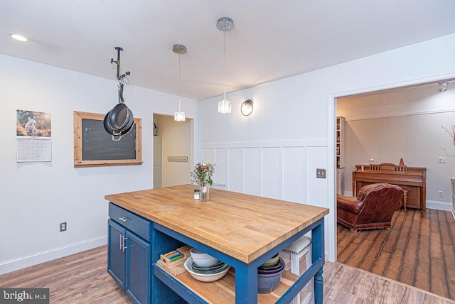 dining area featuring hardwood / wood-style floors