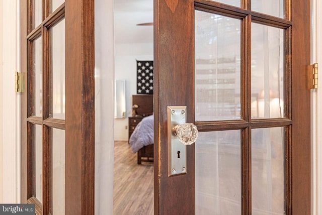 hallway with wood-type flooring