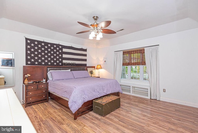 bedroom featuring hardwood / wood-style floors and ceiling fan