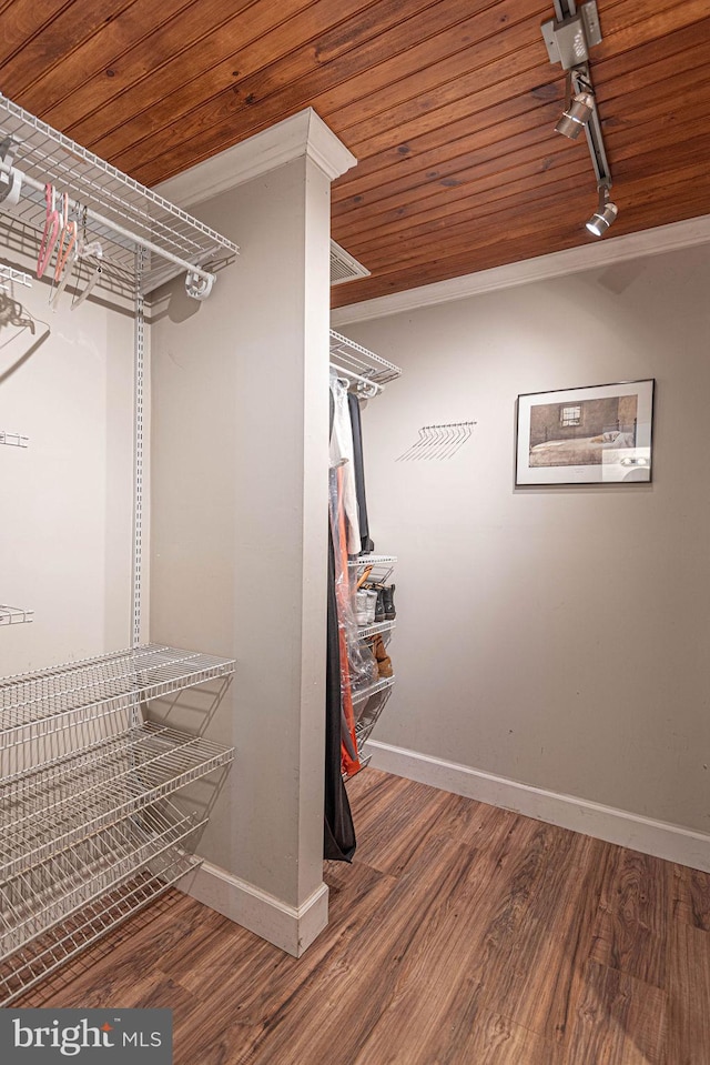 spacious closet featuring hardwood / wood-style flooring