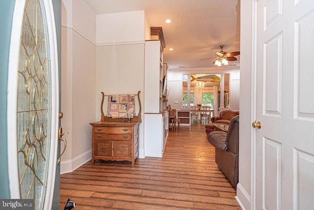 entryway featuring wood-type flooring and ceiling fan