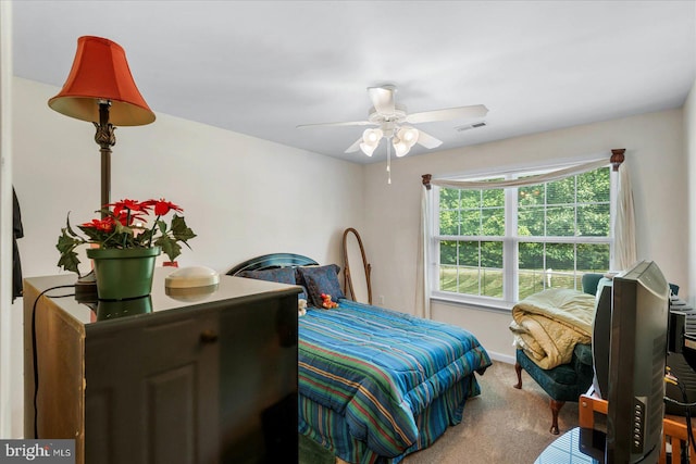 carpeted bedroom with ceiling fan