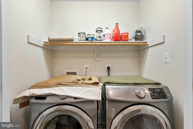 laundry area featuring separate washer and dryer