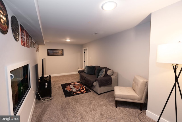 living room with light colored carpet