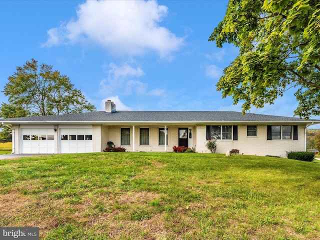 ranch-style house with a front lawn and a garage