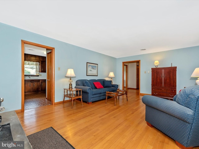 living room featuring light wood-type flooring