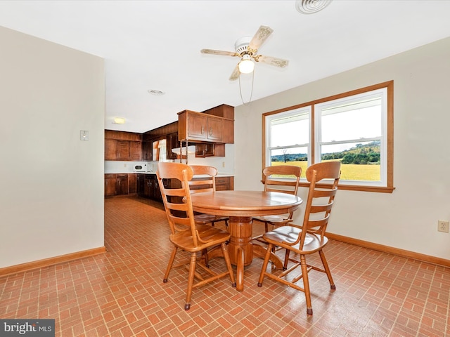 dining room with ceiling fan