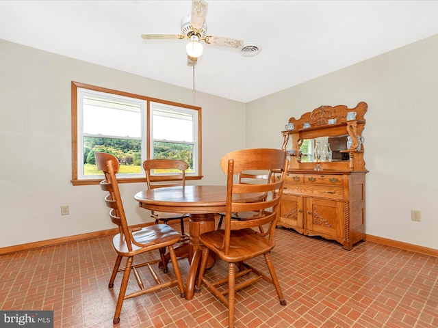 dining area with ceiling fan