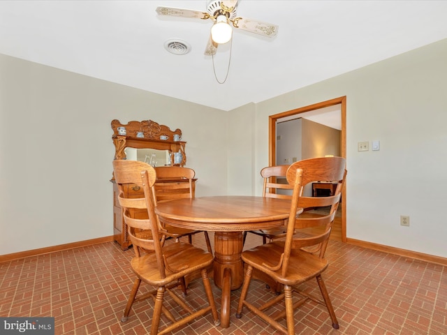 dining area with ceiling fan