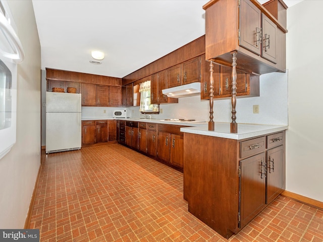 kitchen featuring white appliances