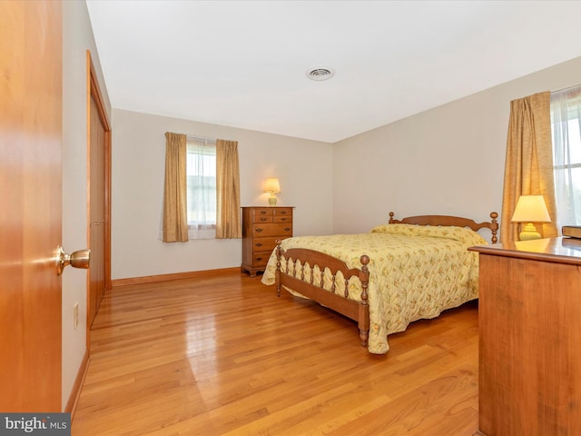 bedroom featuring light wood-type flooring