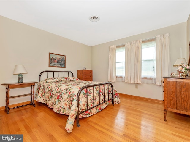 bedroom featuring light hardwood / wood-style flooring