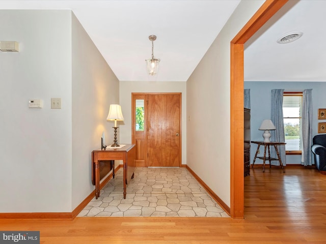 foyer featuring light hardwood / wood-style flooring