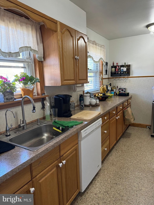 kitchen featuring sink and dishwasher