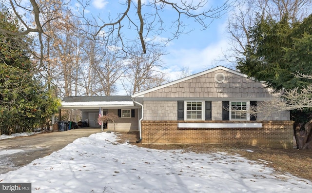 view of front facade with a carport