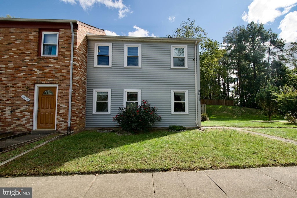 exterior space featuring a lawn