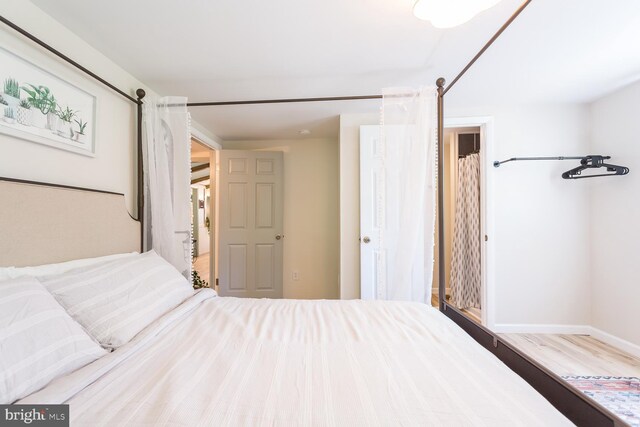 bedroom featuring baseboards