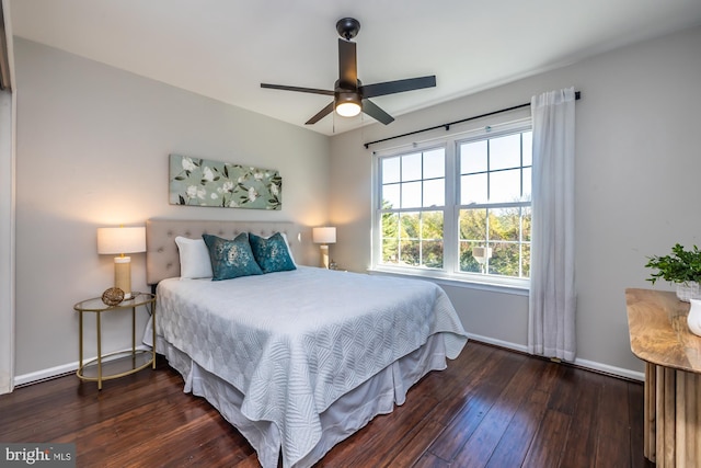 bedroom featuring dark wood-type flooring and ceiling fan