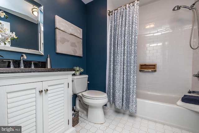 full bathroom featuring vanity, toilet, and shower / tub combo with curtain