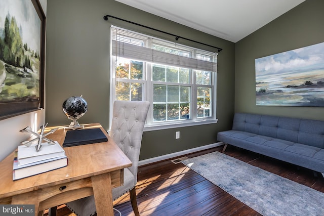 office area featuring dark wood-type flooring and vaulted ceiling