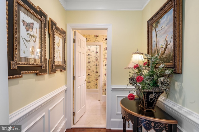 hallway featuring crown molding