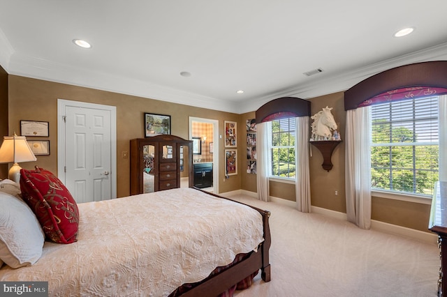 carpeted bedroom featuring crown molding