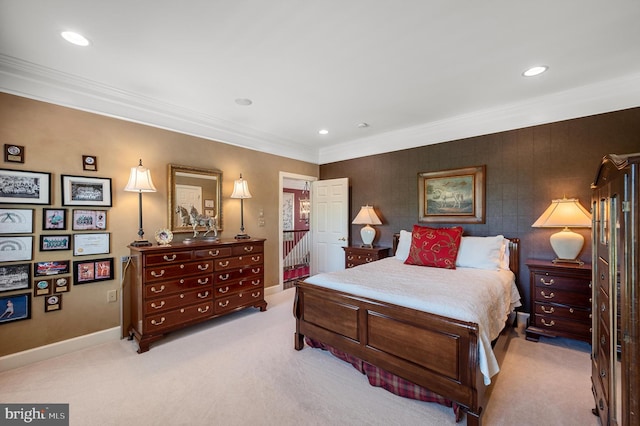 carpeted bedroom featuring crown molding