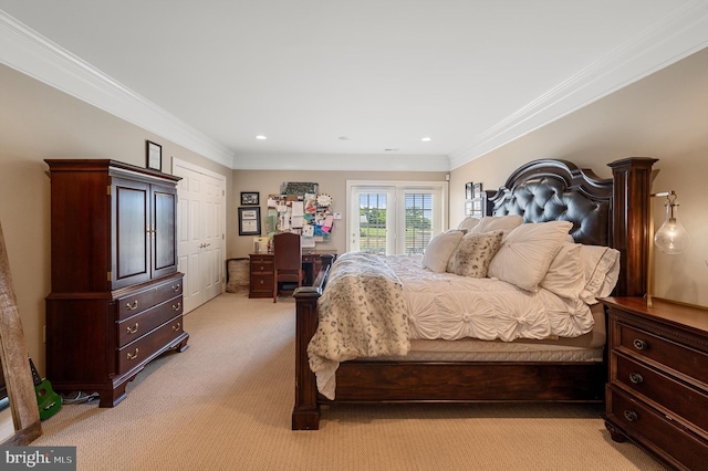 carpeted bedroom with ornamental molding and access to exterior