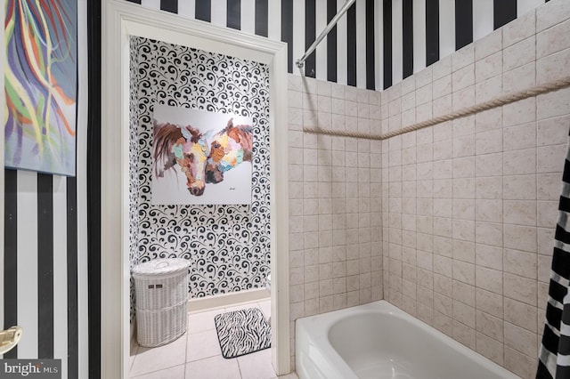 full bathroom featuring shower / bath combo, tile patterned flooring, and wallpapered walls