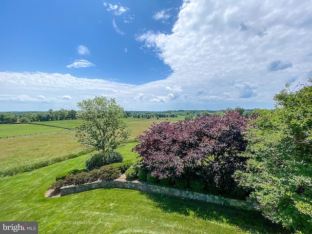 exterior space with a rural view