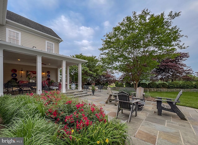 view of patio / terrace featuring a fire pit