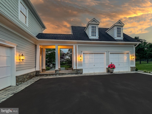 view of front of property featuring a garage